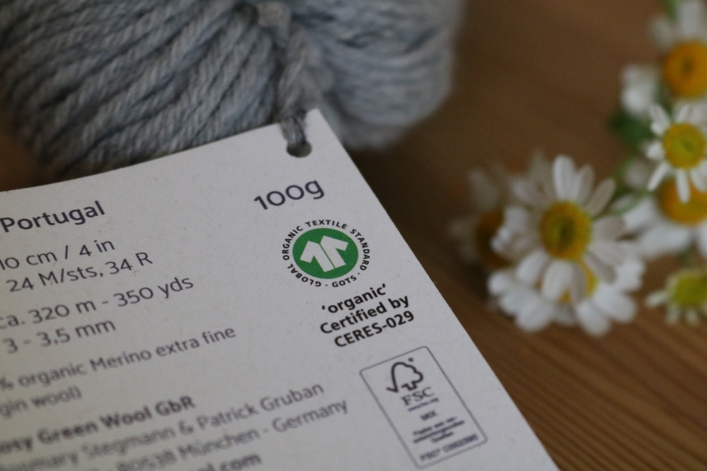 Rosy Greenwool-Etikett mit GOTS-Logo